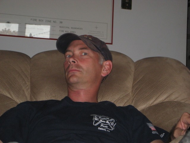 Firefighter Brian Brown relaxing on an Engine Transfer to Thorndale.